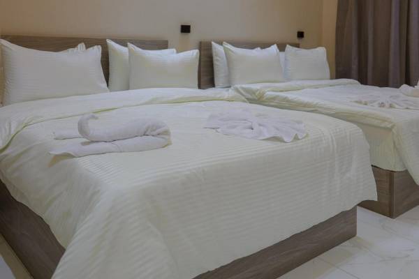 Deluxe Queen Room with Two Queen Beds - Accommodation