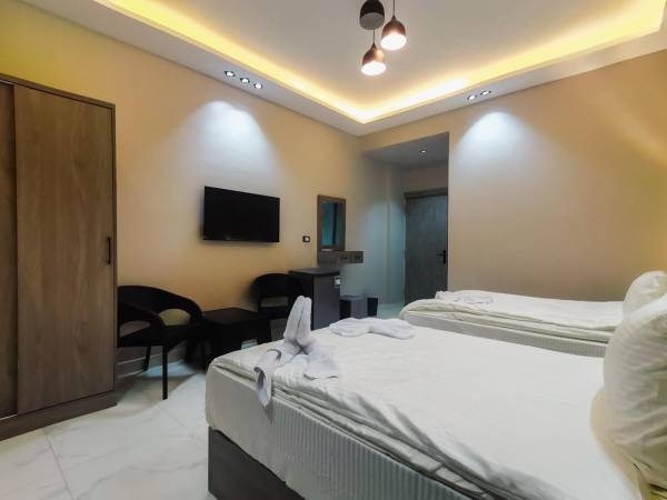 Deluxe Doppel- oder Zweibettzimmer mit Stadtblick